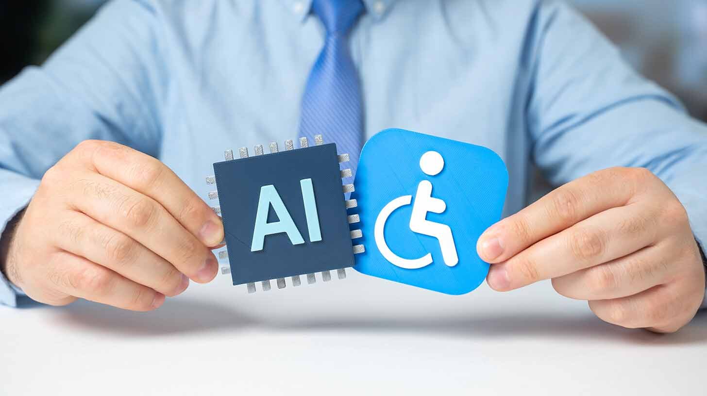 person wearing blue and a tie holding up two small signs; one with disability symbol and the other with the letters AI