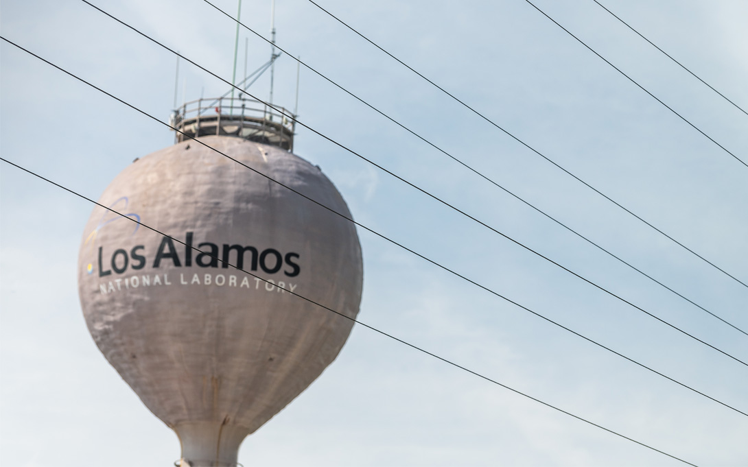 Water tower with Los Alamos National Laboratory written on it.  