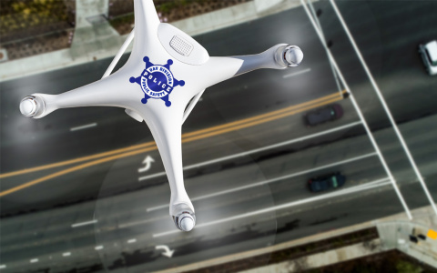 police drone flying over highway